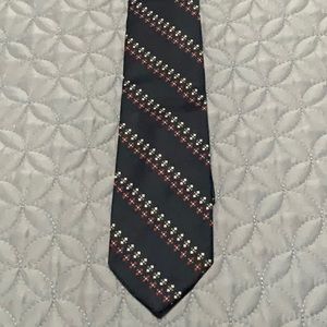 Cornell of California men’s tie. Dark blue with red/white. 100% polyester. 3”